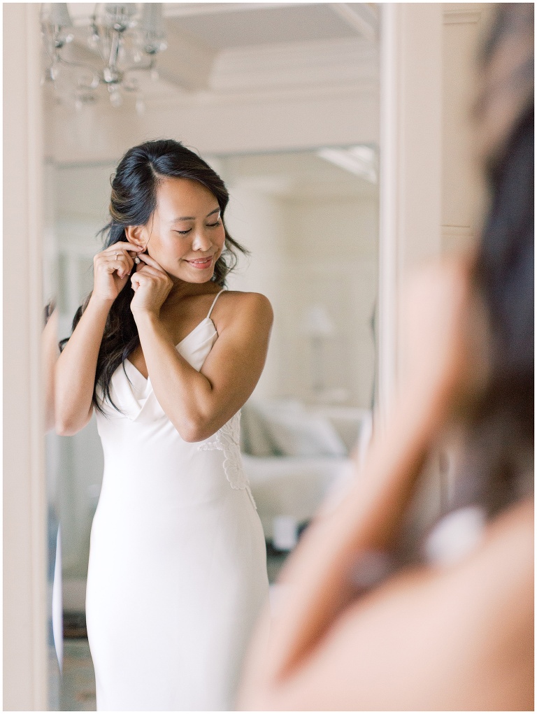 Bride getting ready in Veritas Vineyards & Winery bridal suite