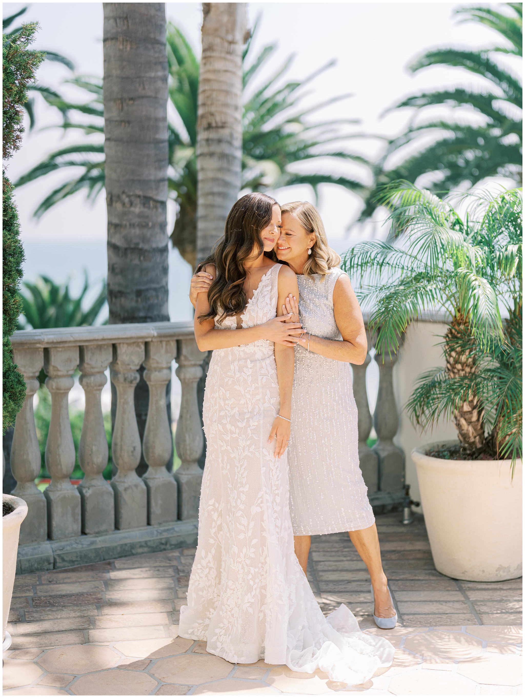 Bride getting ready for her wedding with her mom at the Bel Air Bay Club