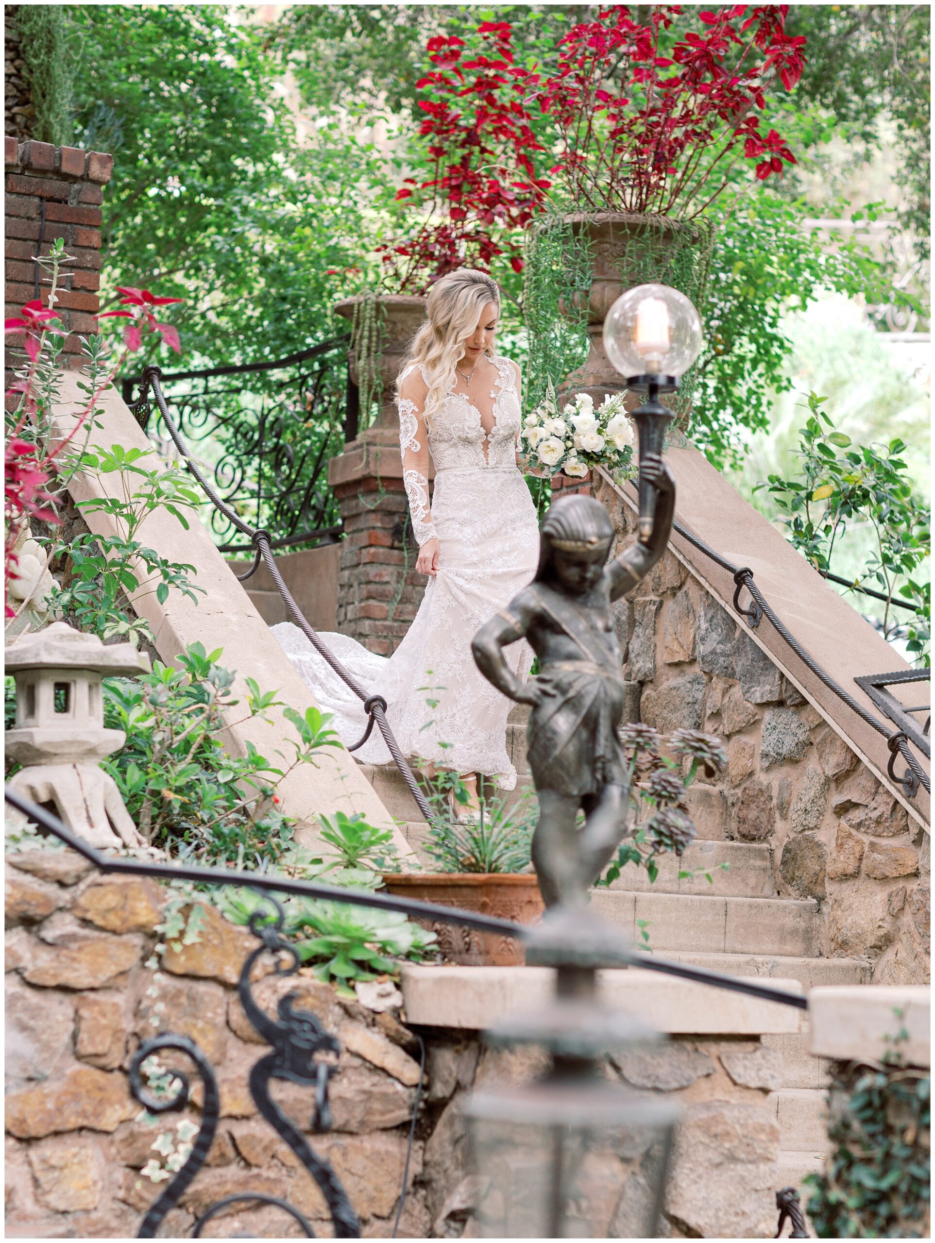 Bride walking down steps at the Houdini Estate