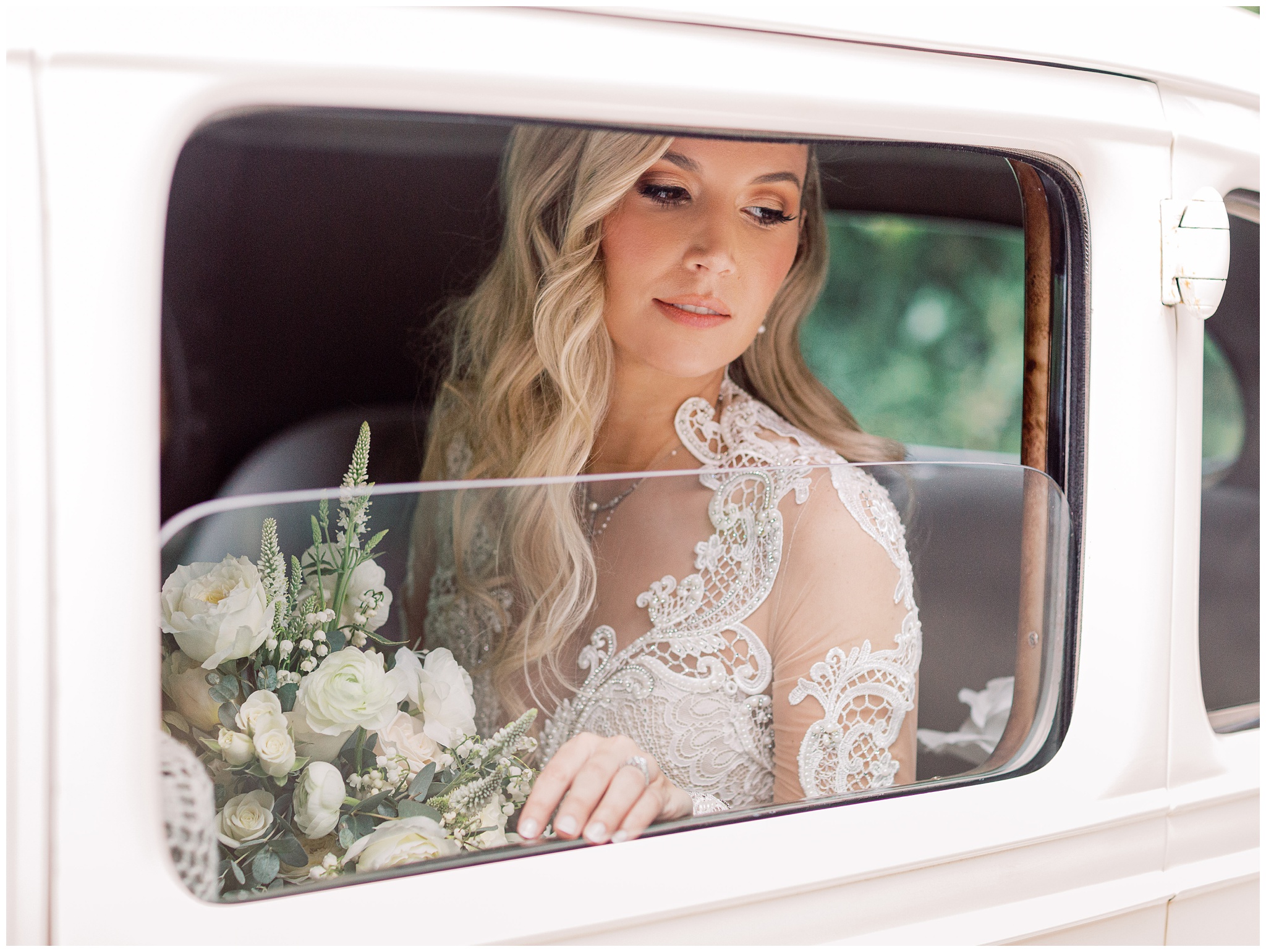 Bridal portrait in a vintage Rolls Royce