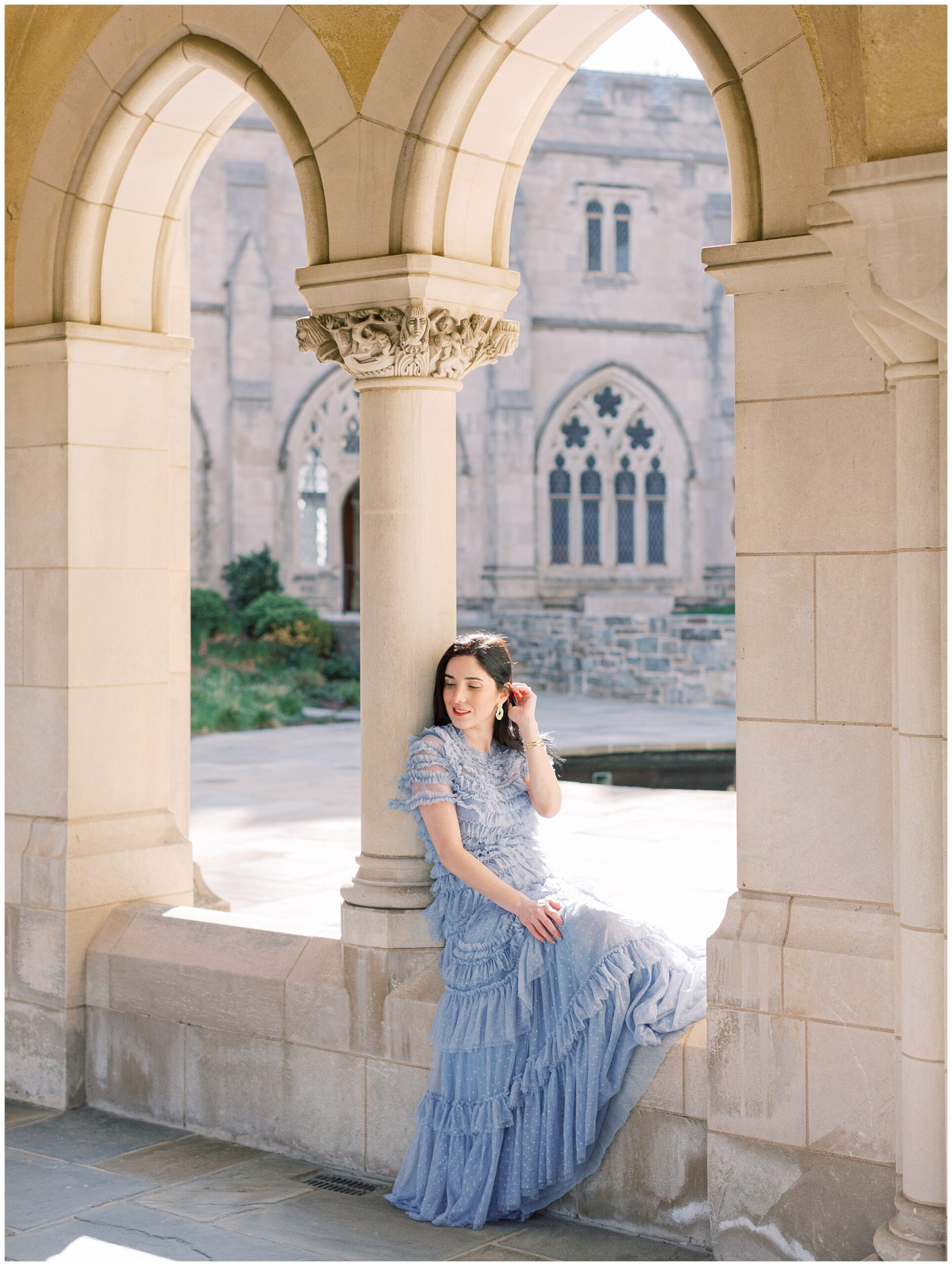 Washington National Cathedral engagement photo girl sitting in archway