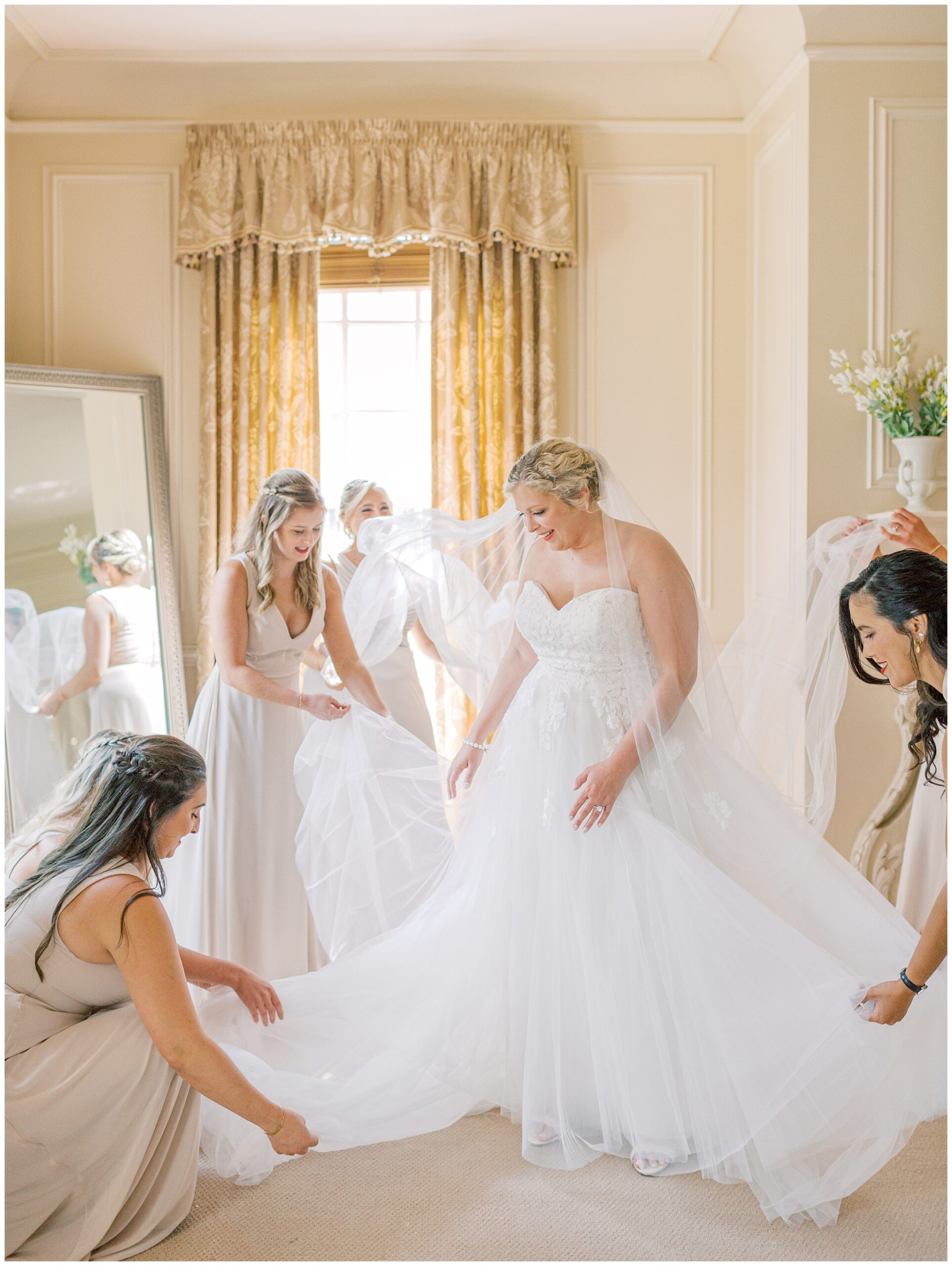 Bride getting ready in the Great Marsh Estate bridal suite