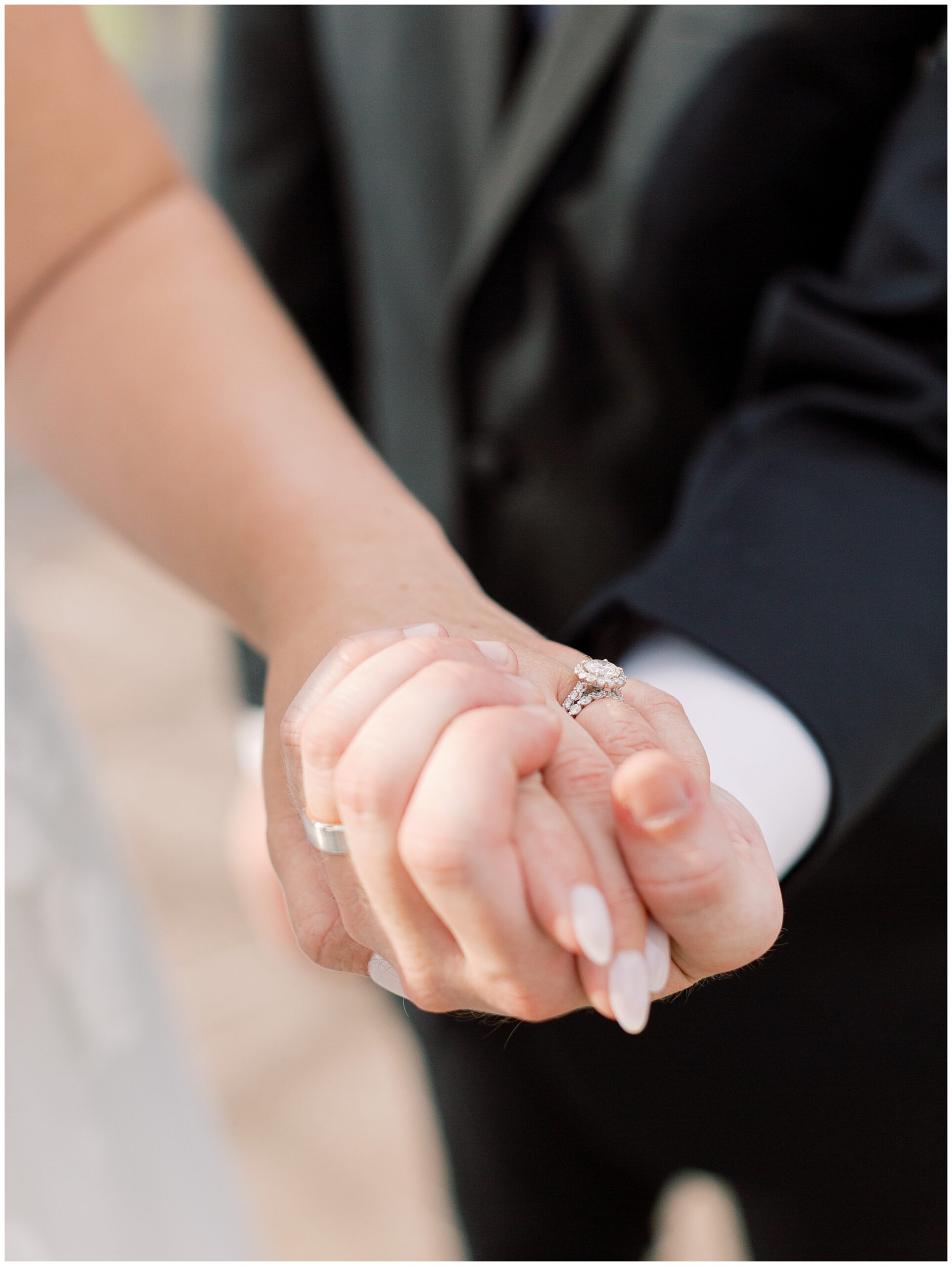Close up of Bride's wedding band and engagement ring