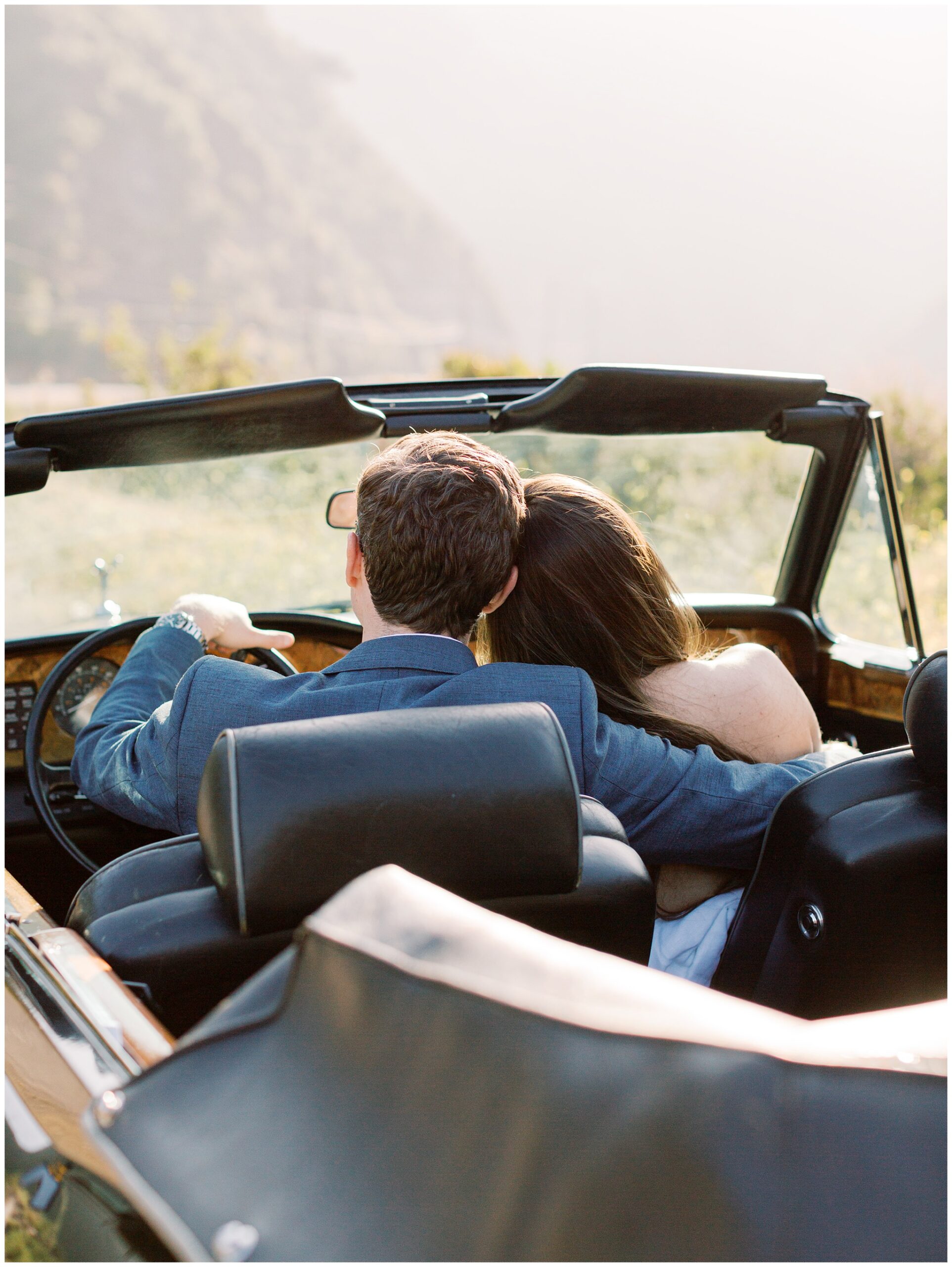 Malibu Hills California engagement photo in vintage rolls royce car