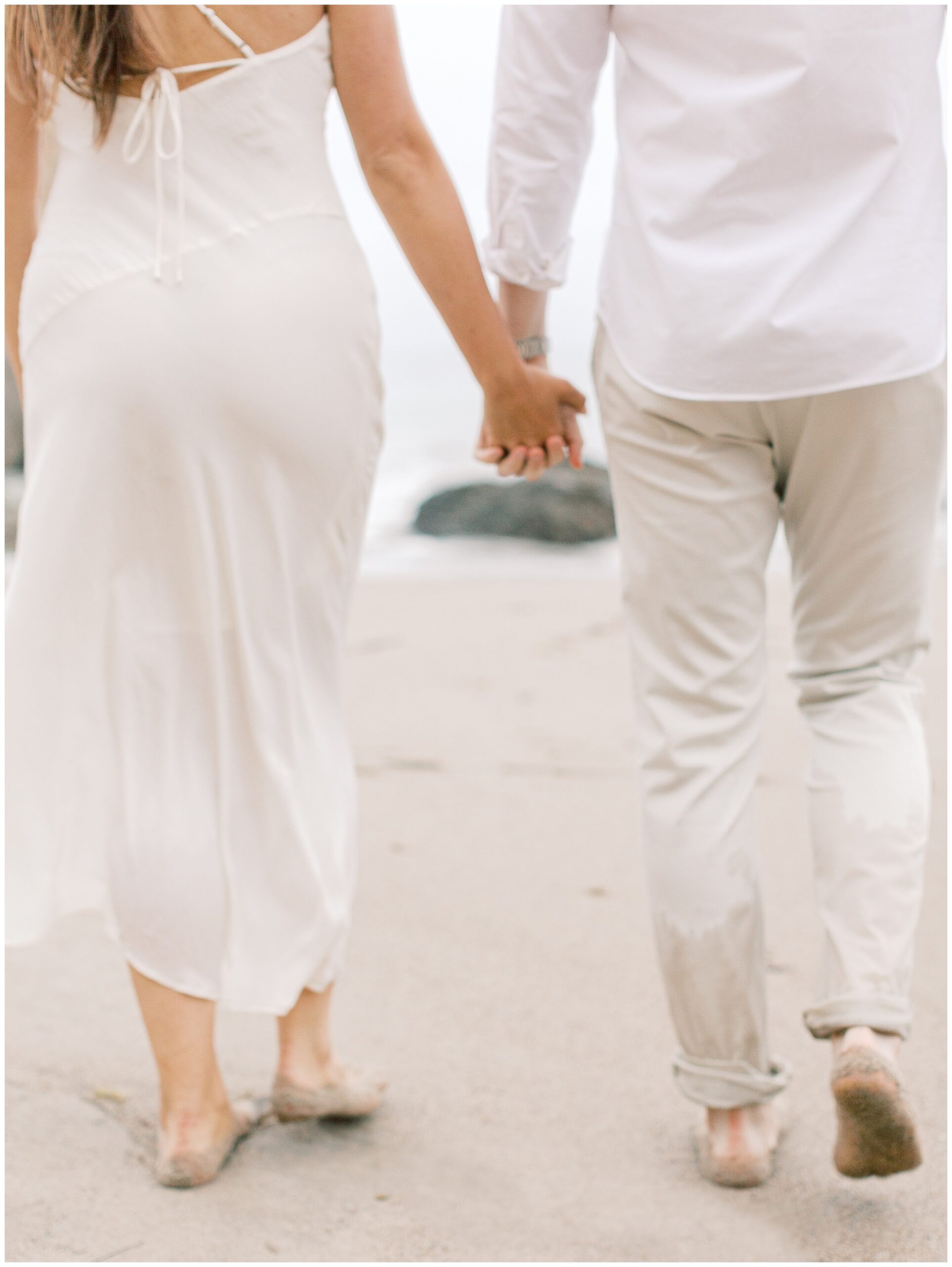 El Matador Beach engagement photo on overcast day