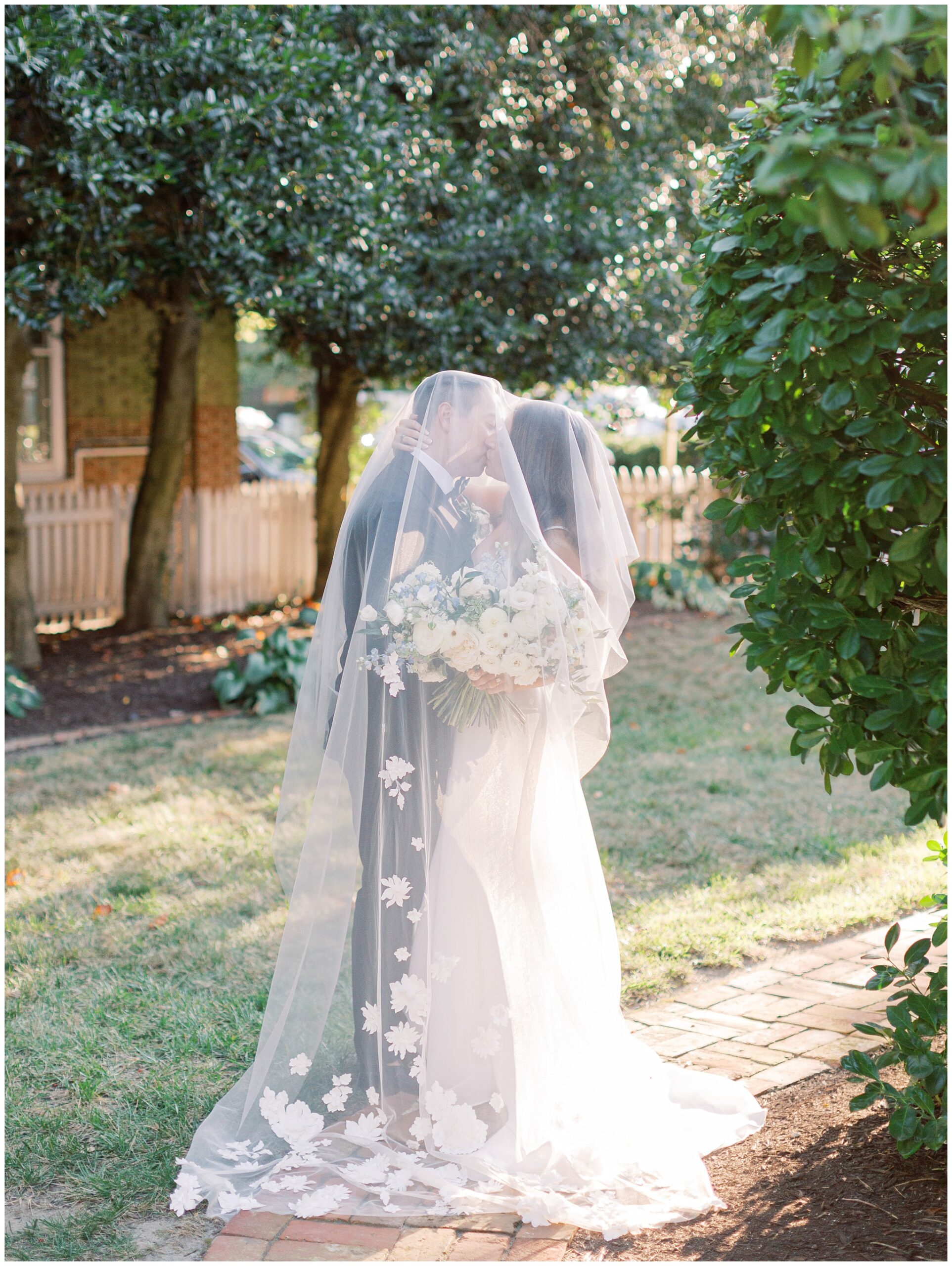 Tidewater Inn wedding newlywed portraits under the veil