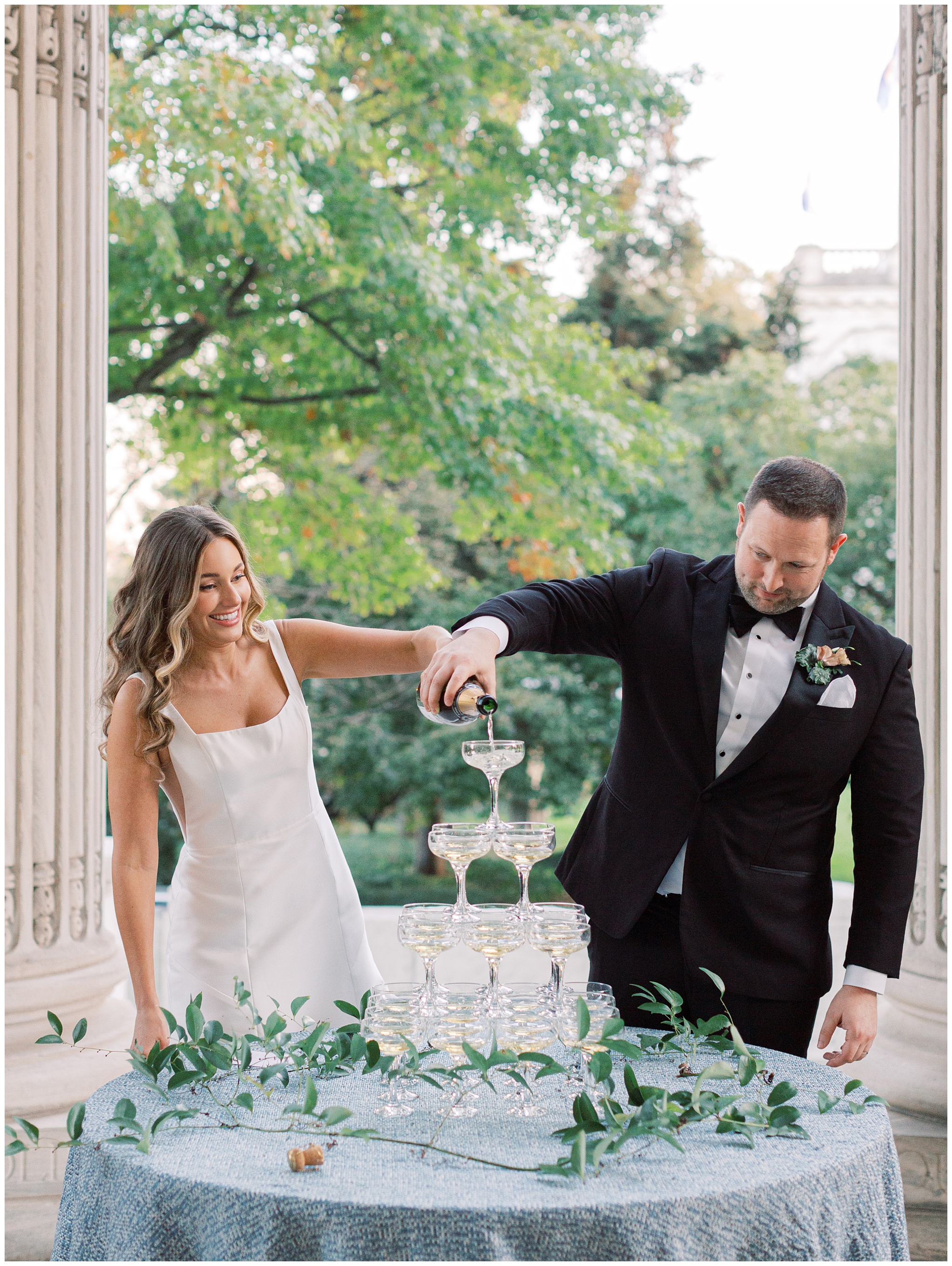 Bride and Groom pouring champagne