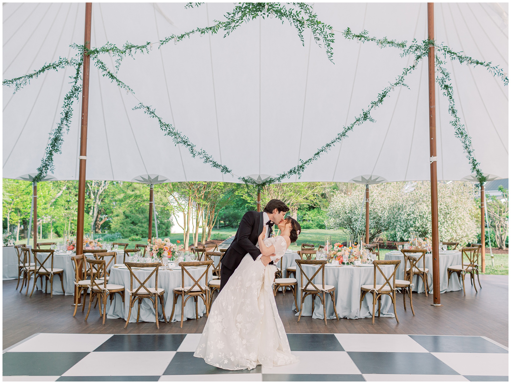 Bride and Groom kissing at Inn at Perry Cabin wedding reception