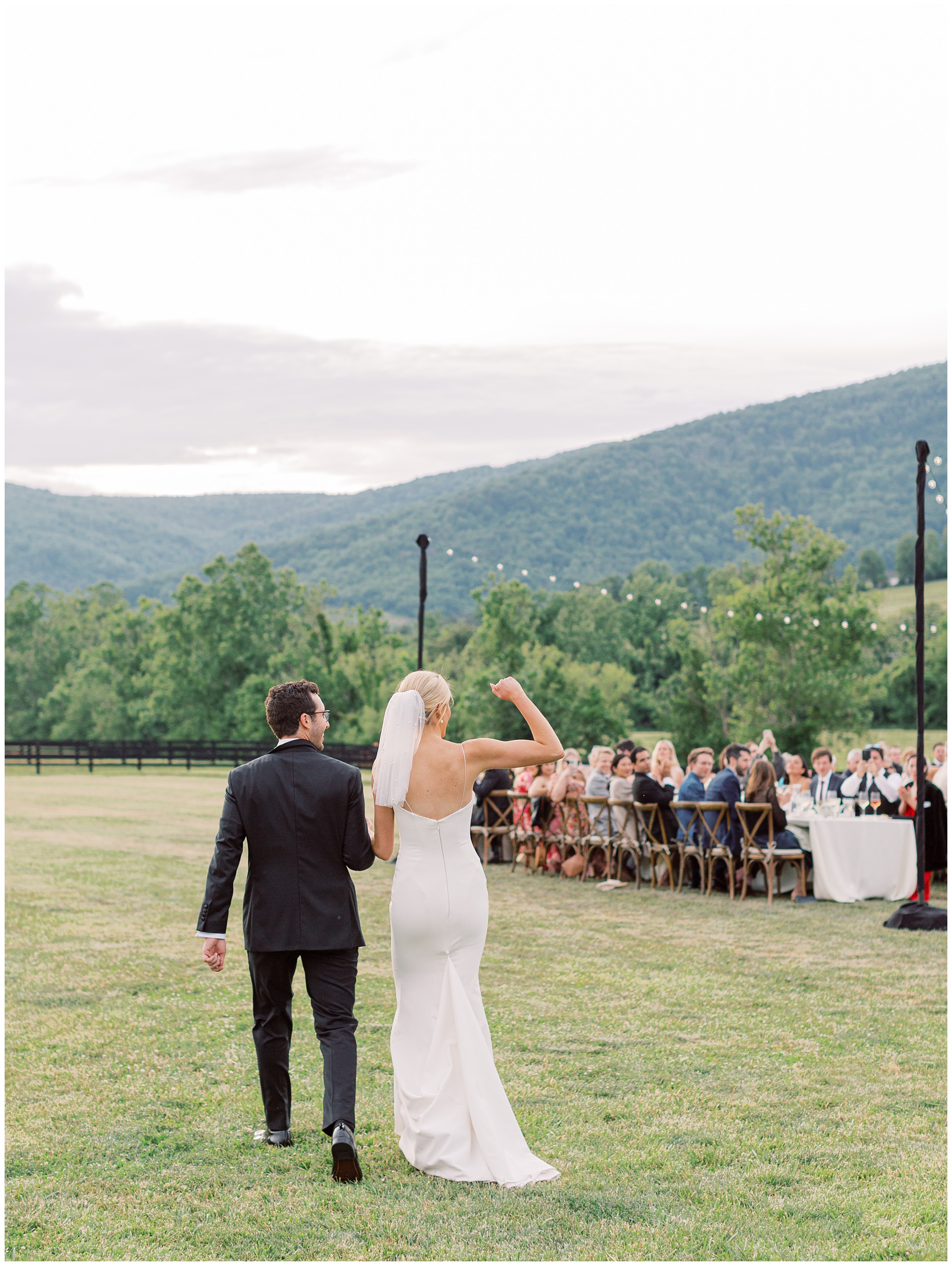 bride and groom entering wedding reception at King Family Vineyards