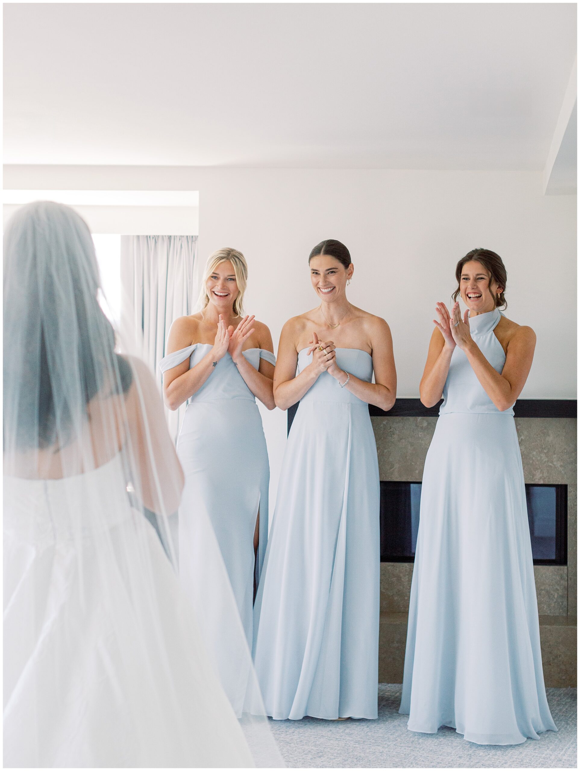 bride and bridesmaids first look