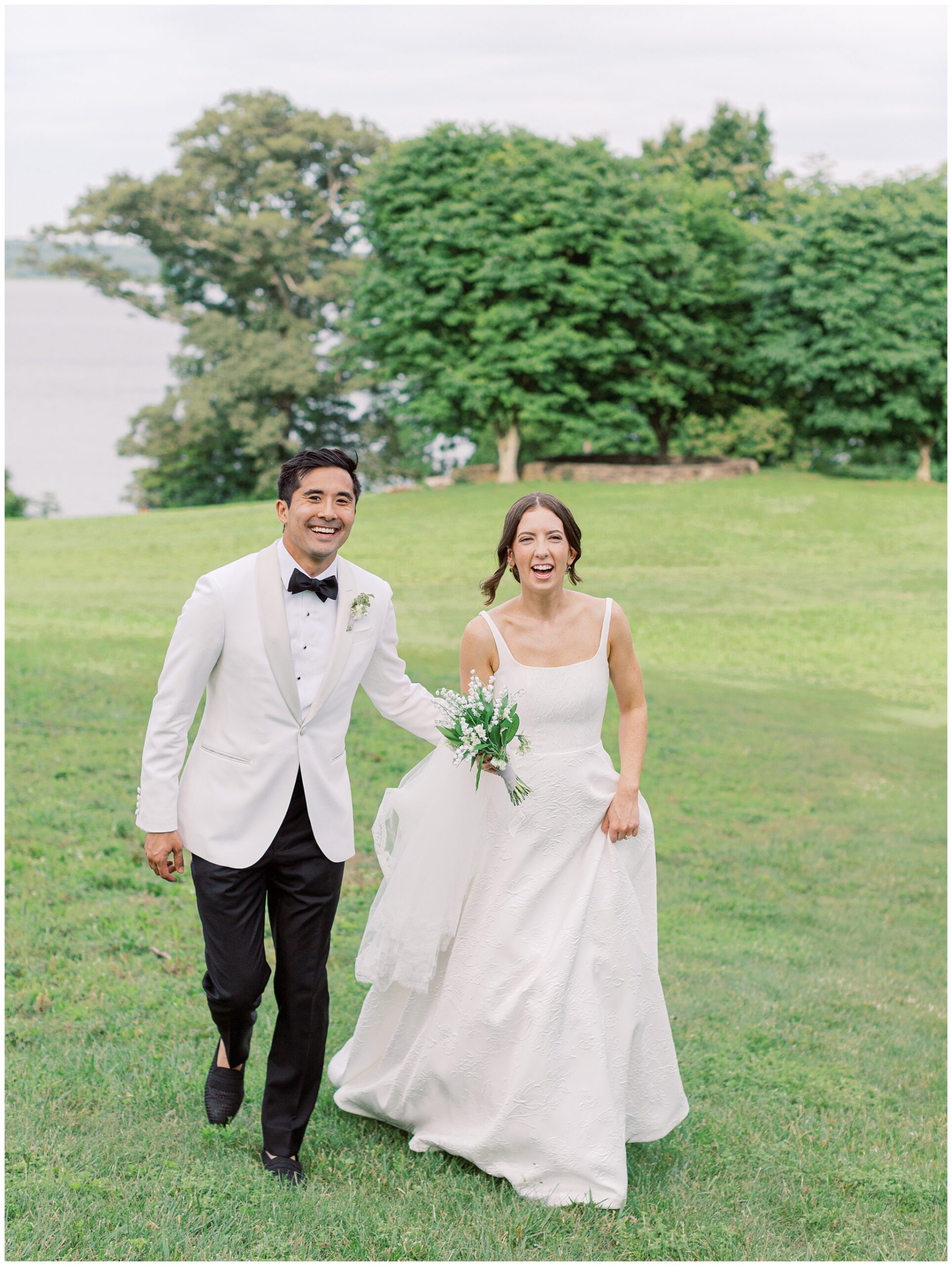 River Run wedding photo of bride and groom walking and laughing