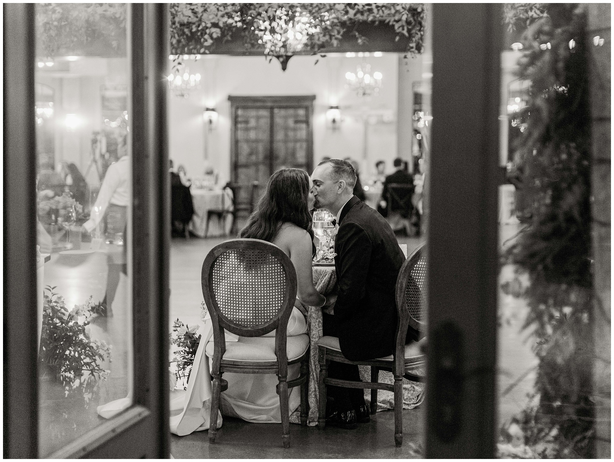 Bride and Groom kissing during Stone Tower Winery wedding reception