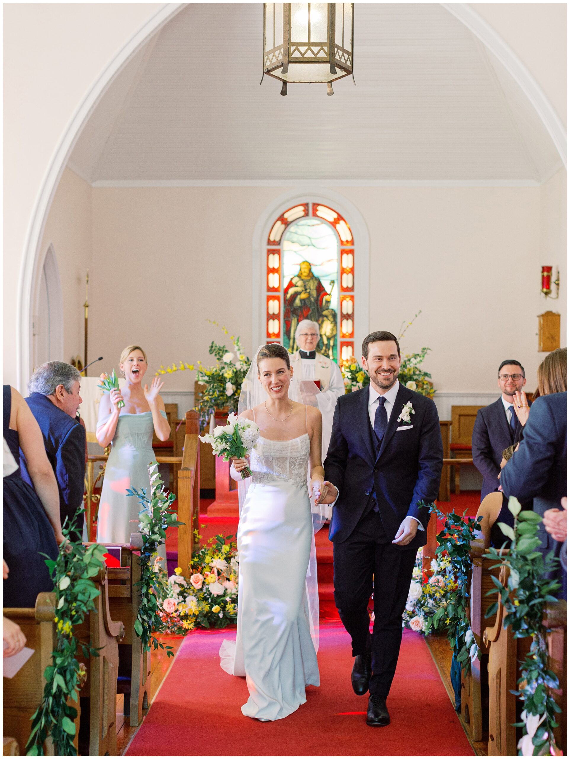 Bride and Groom walking down the aisle