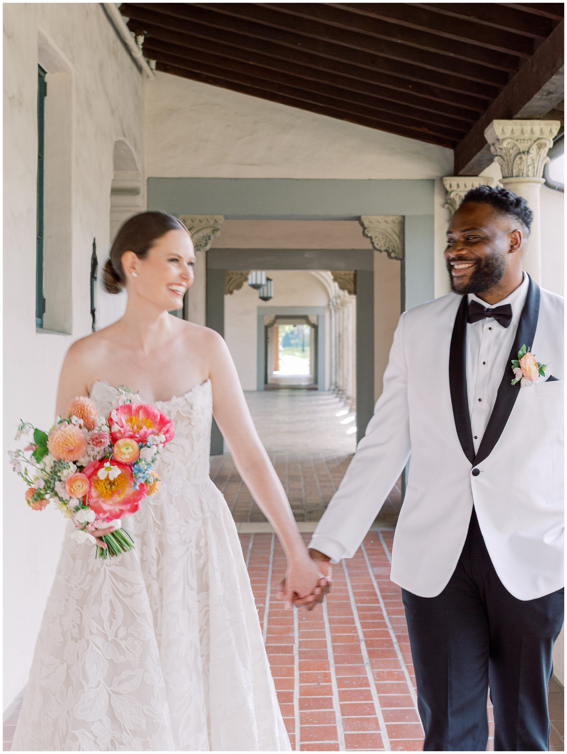 Blurry motion shot of Bride and Groom walking at Caltech Athenaeum wedding