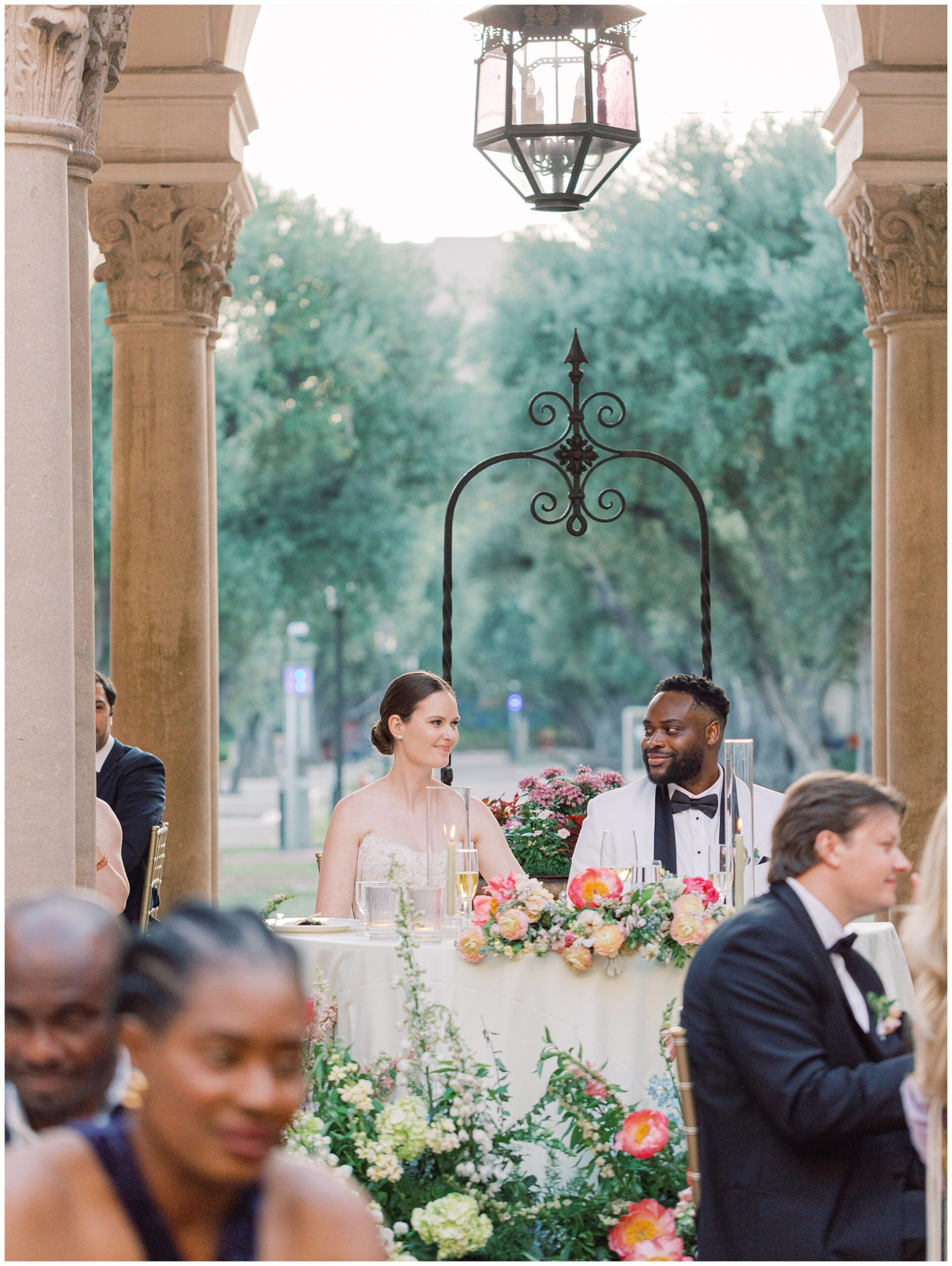 Bride and Groom looking at each other during Caltech Athenaeum wedding reception