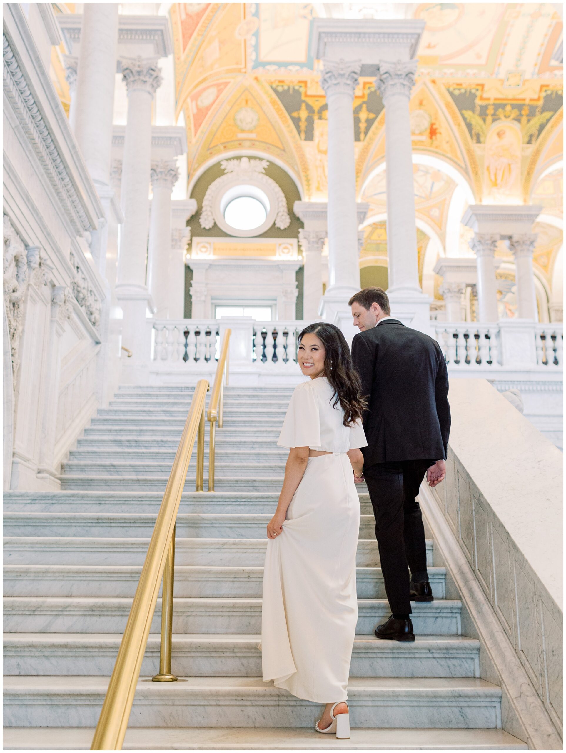 Couple on marble staircase at Library of Congress in Washington DC