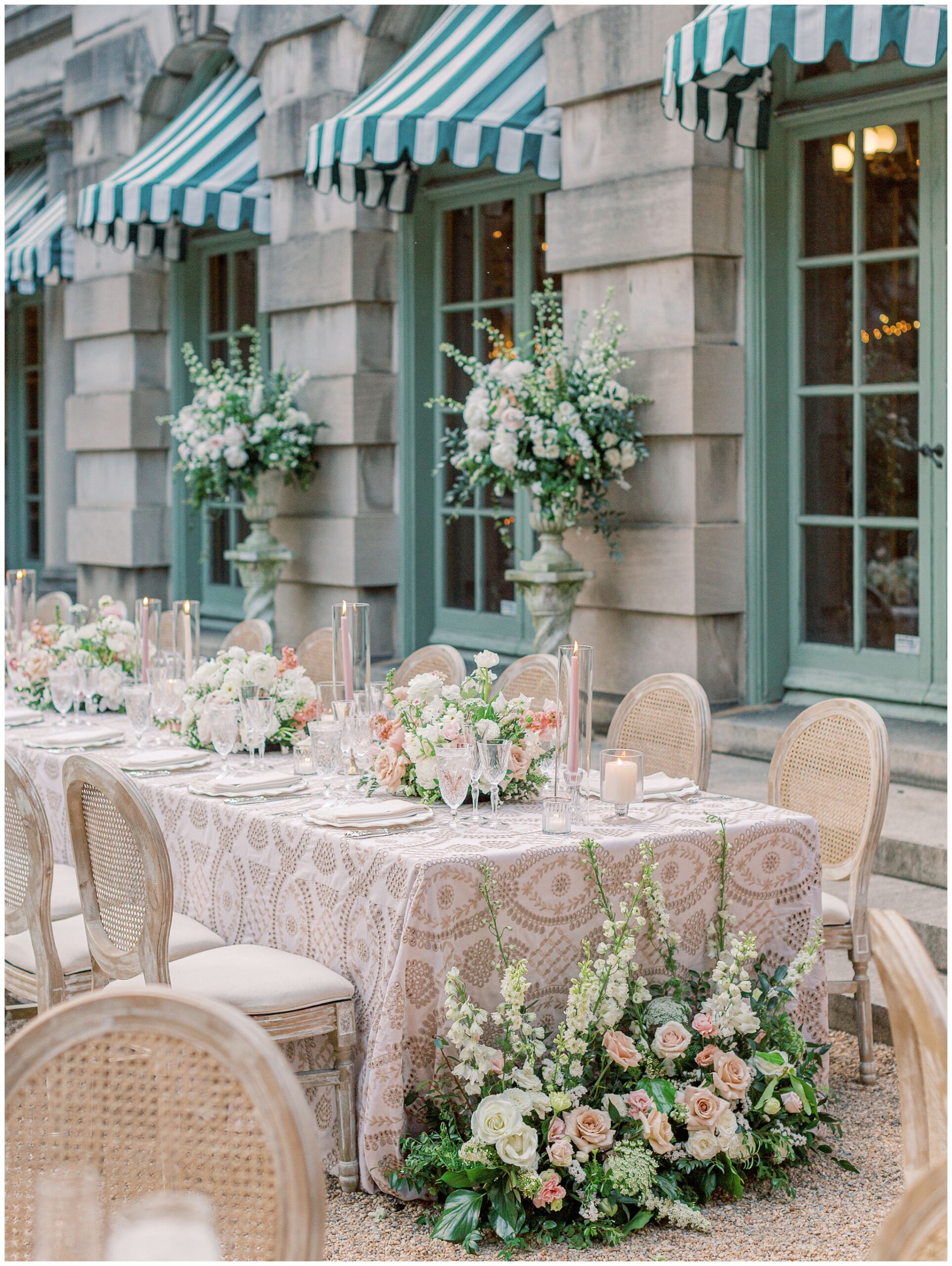 Elegant tablescape with cream, blush, and green floral arrangements at Larz Anderson House wedding in Washington, DC