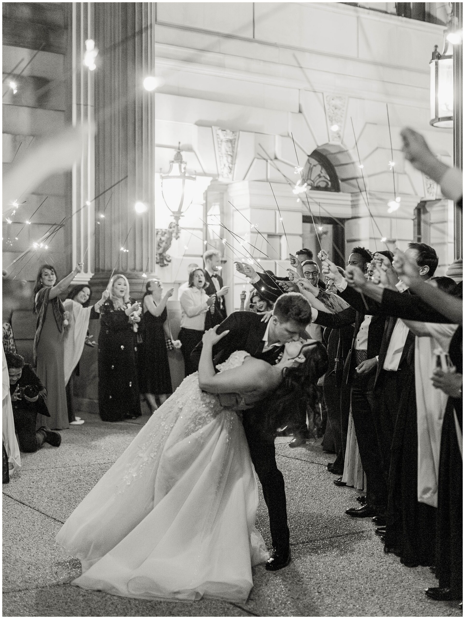 Bride and groom exiting under sparklers