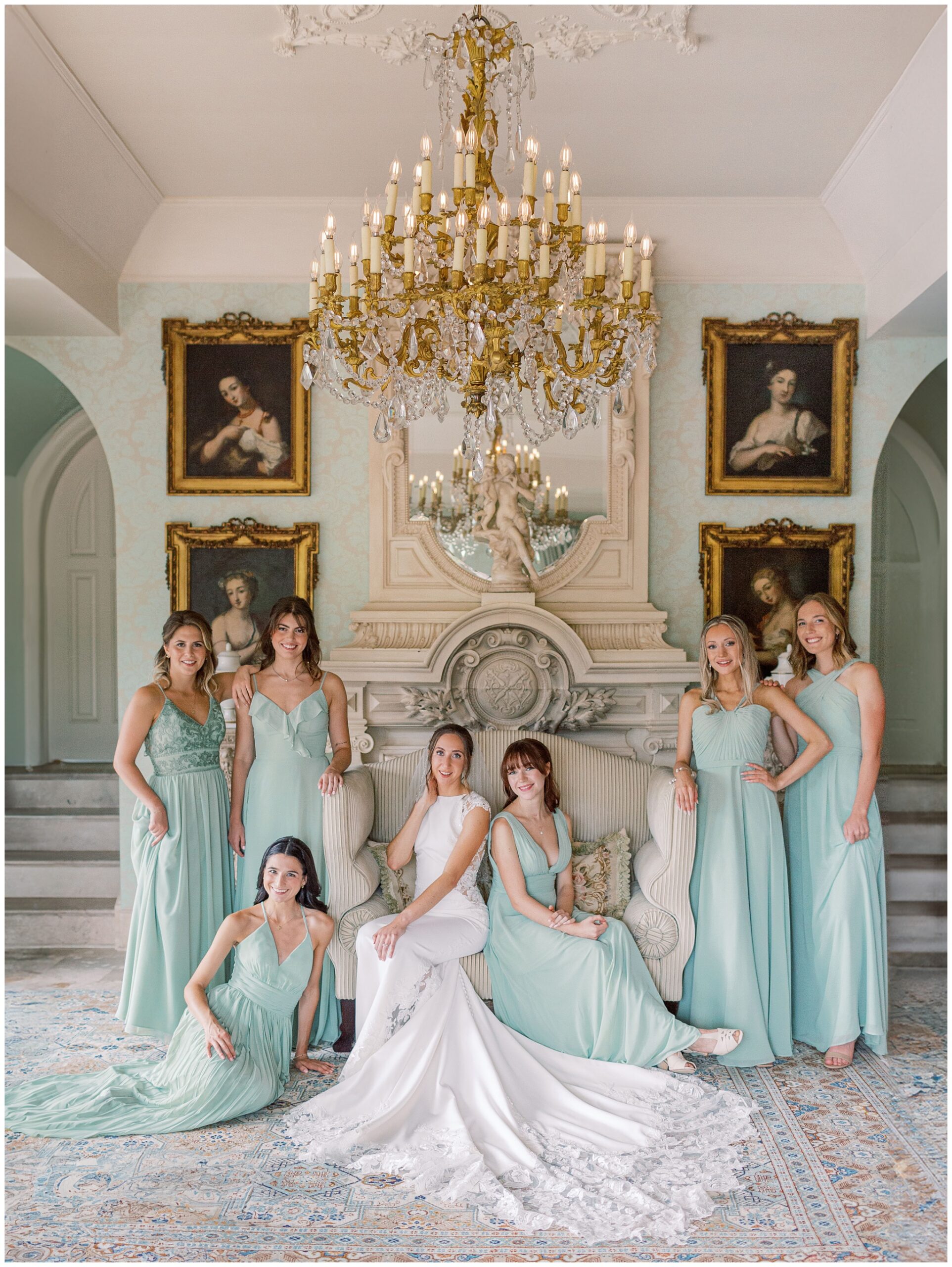Bride and bridesmaids posing together in a fashion-inspired portrait in the Parlor