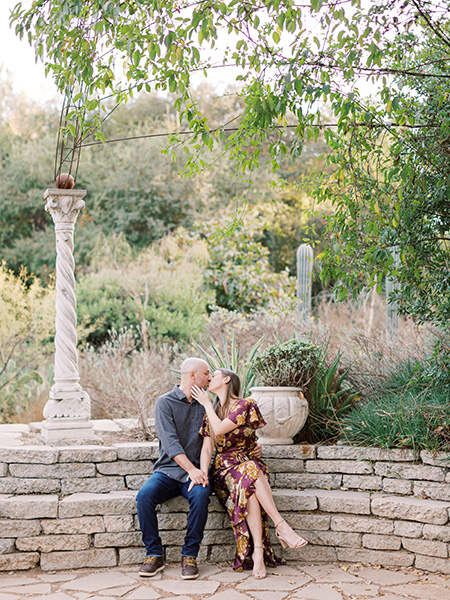Couple kissing during their engagement session at Arlington Garden in Pasadena