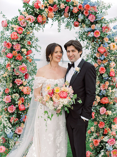 Inn at Perry Cabin wedding photo by colorful ceremony arch